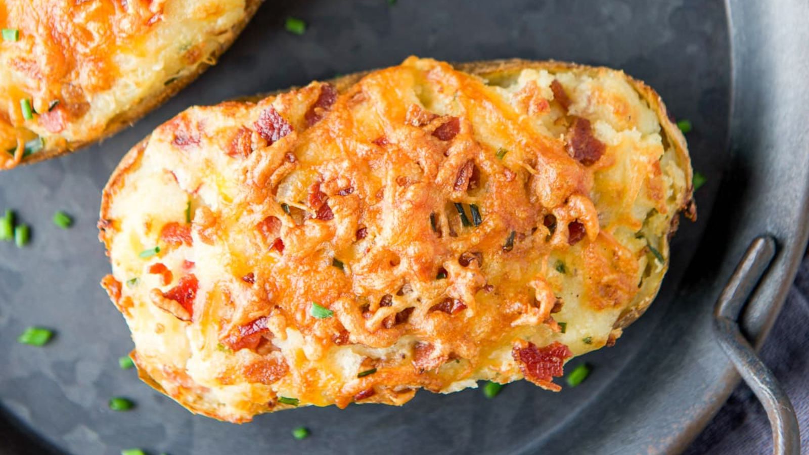 Baked potato on a plate.