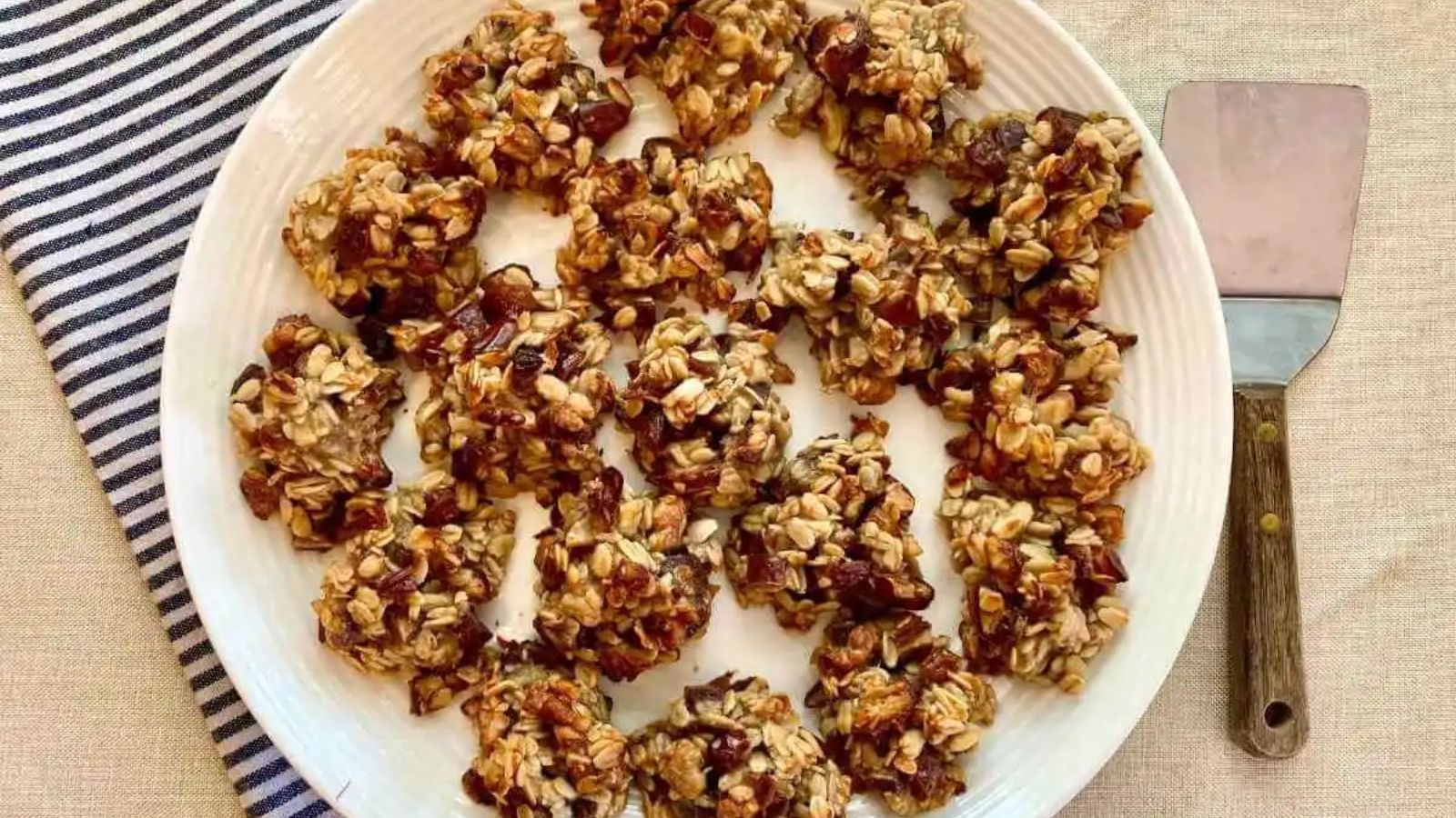 Banana date oatmeal cookies on a plate.