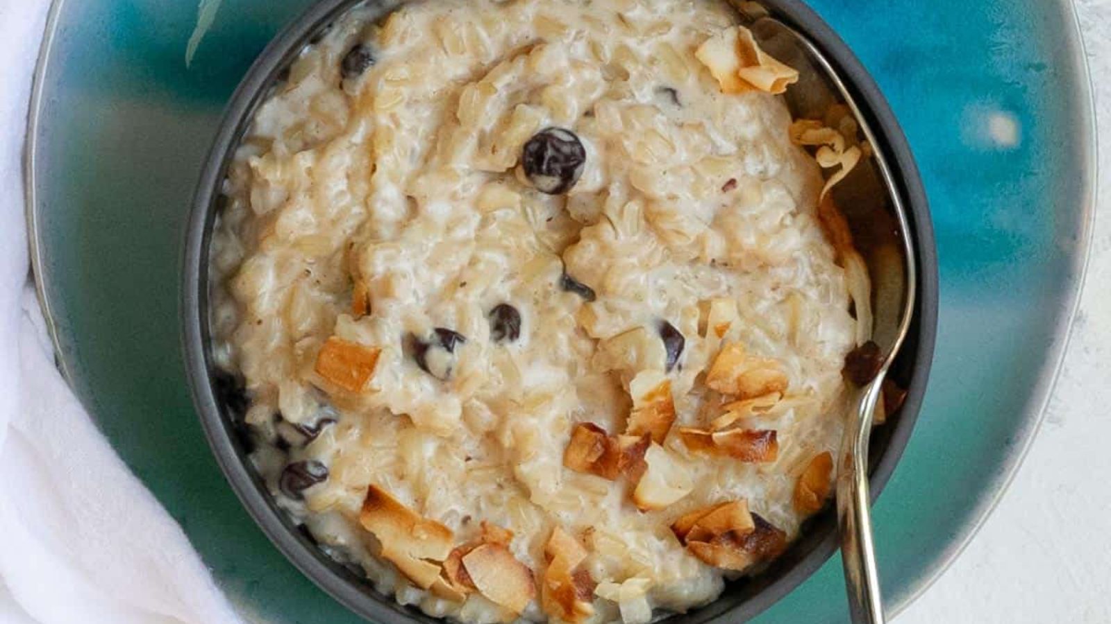 Brown rice pudding in a bowl.
