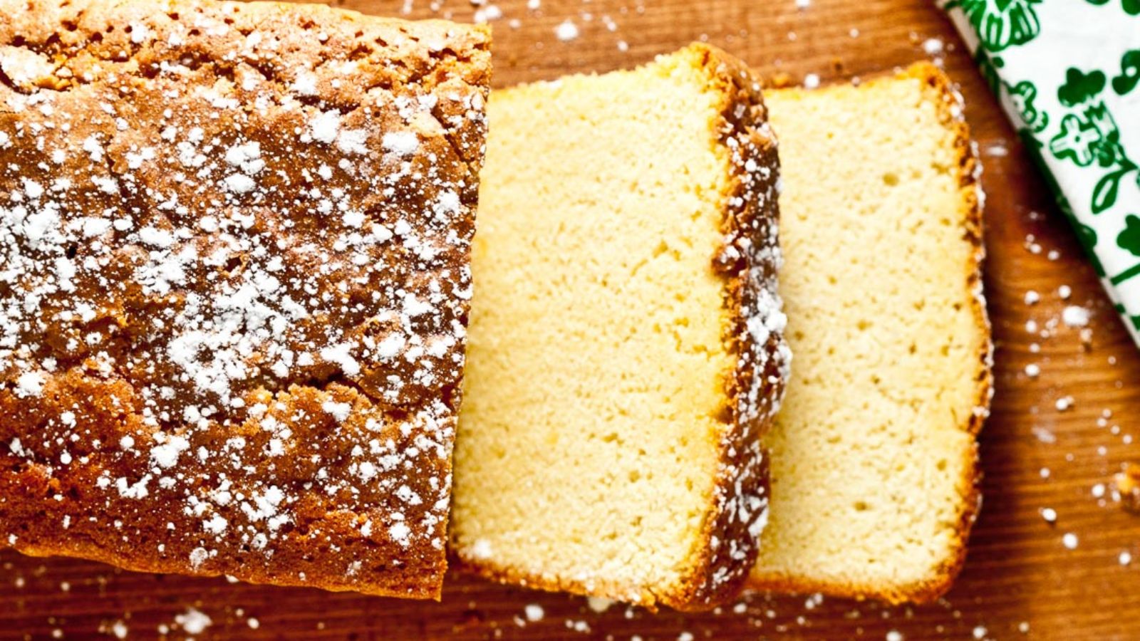 Butter pound cake on a wooden surface.