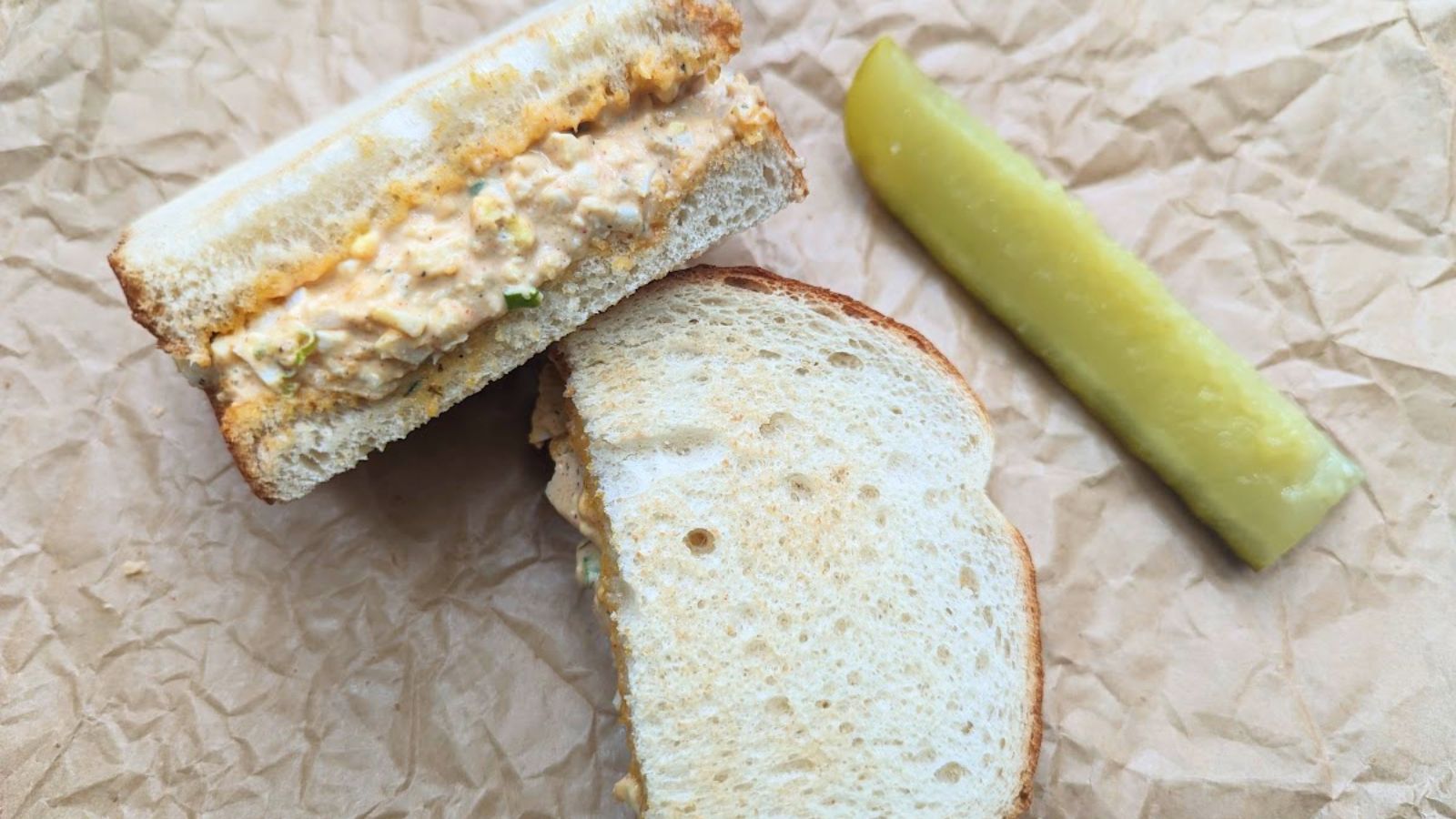 Sliced egg salad on a paper.