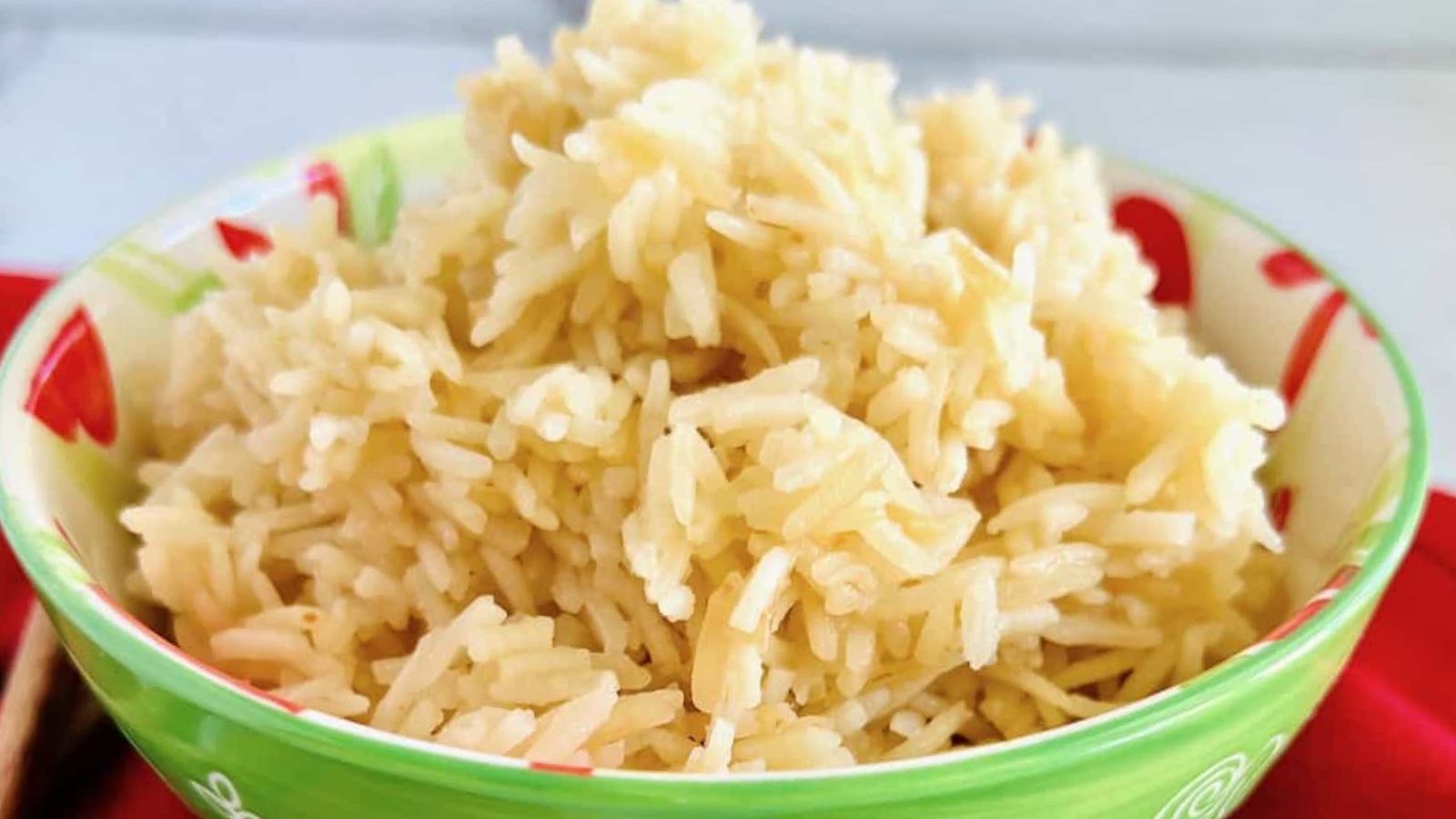 Chicken broth rice in a bowl.