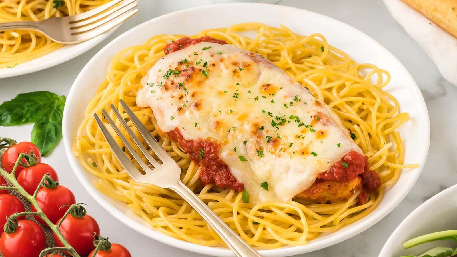Pasta with chicken on a plate.