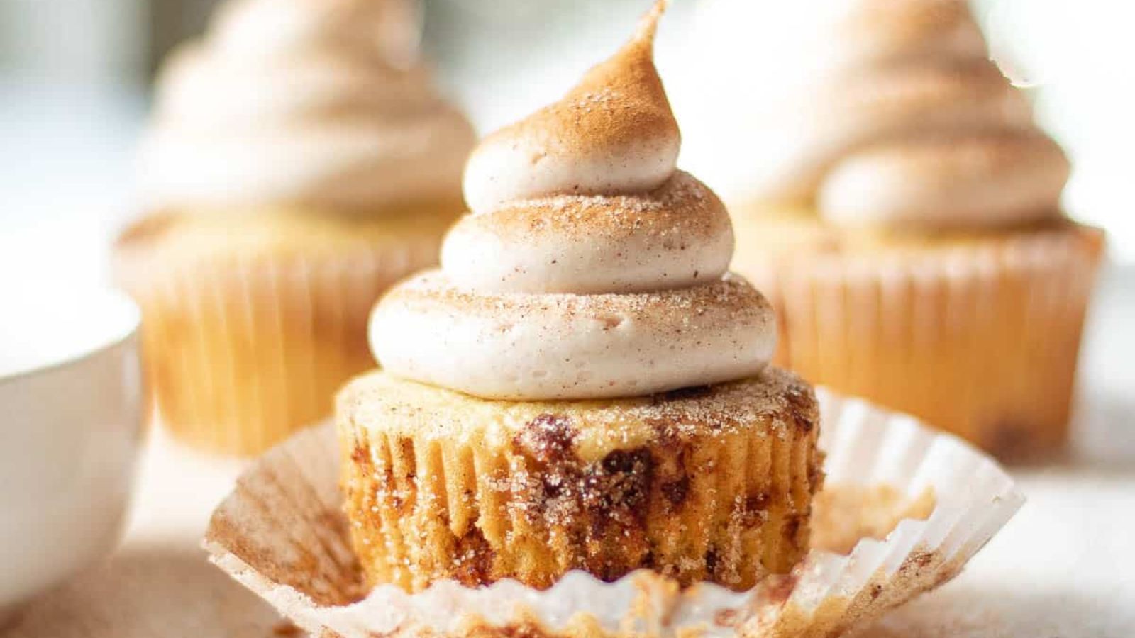 Cinnamon cupcakes with frosting.