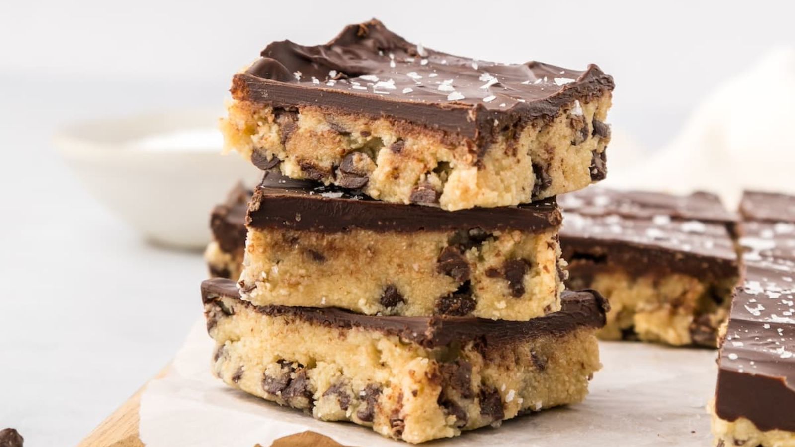 Stack of cookie dough bars.