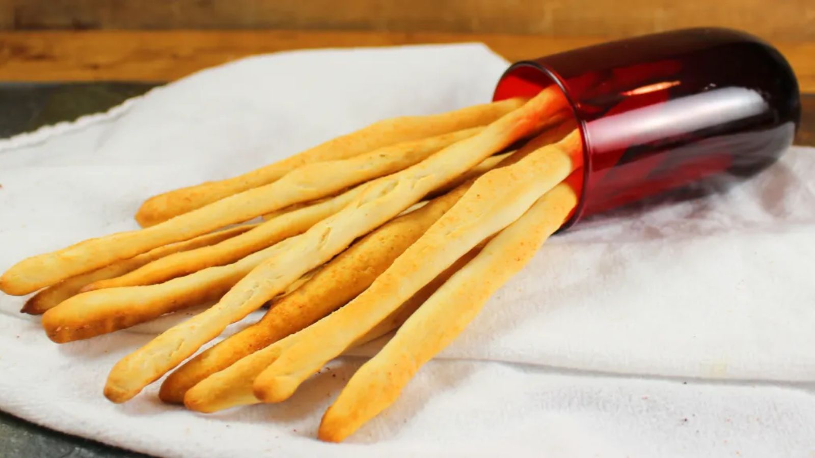 Biscuits breadsticks on a white paper.