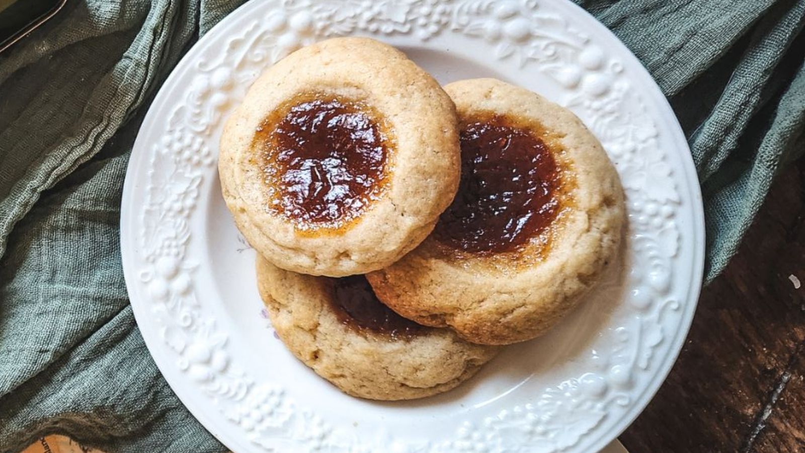 Thumbprint cookies on a plate.