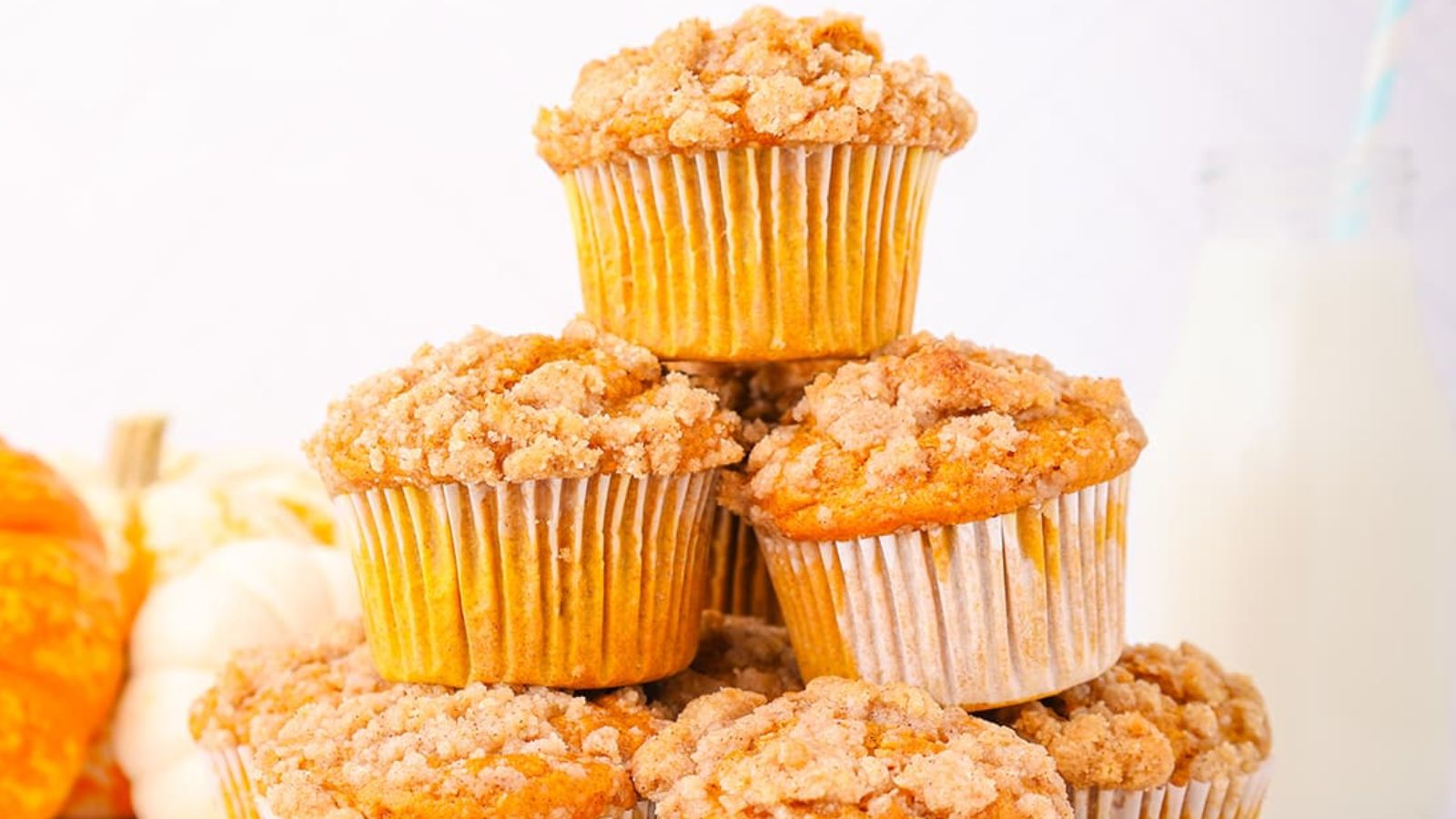 Stack of pumpkin muffins.