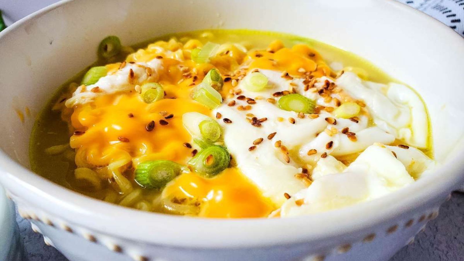 Cheesy ramen ina  bowl.
