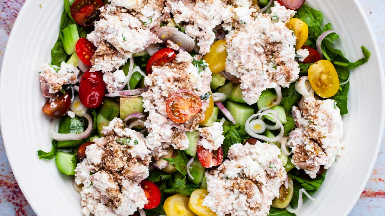 Tuna cucumber salad in a bowl.