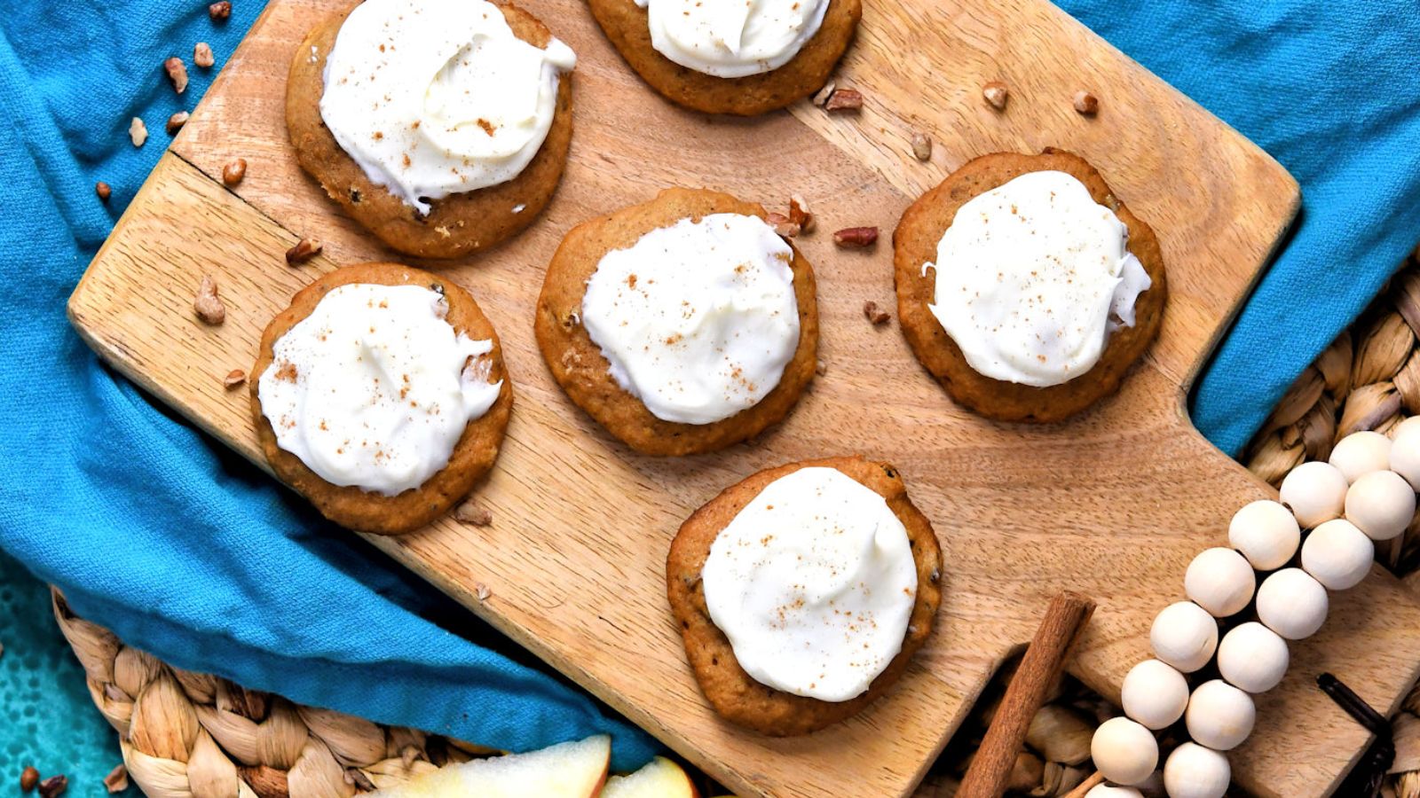 Applesauce cookies on a wooden board.