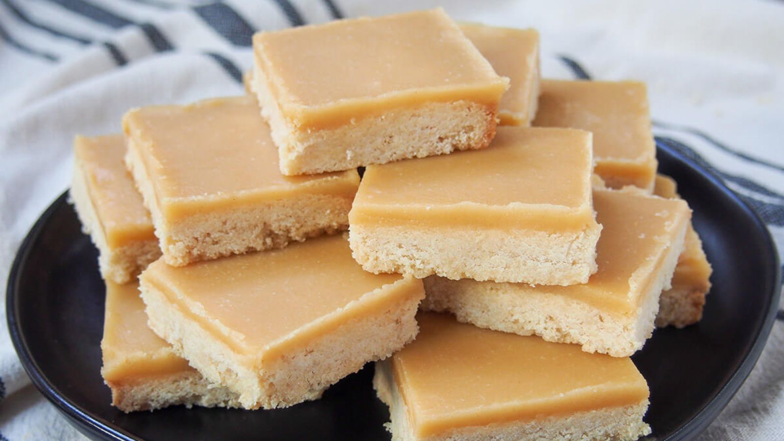 Ginger crunch bars on a plate.