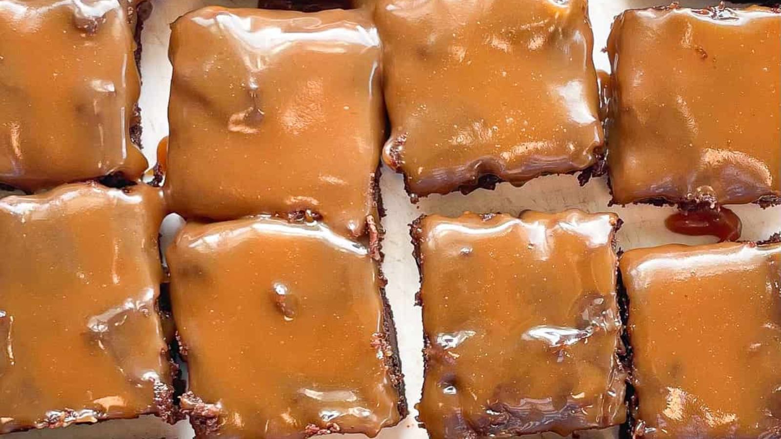 Brownies with caramel on top.