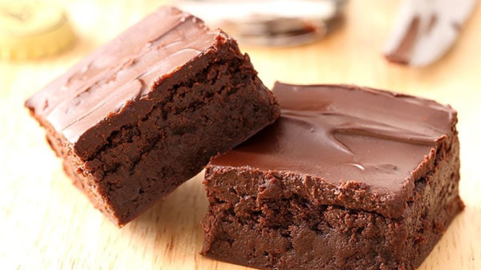 Two slices of chocolate brownies.