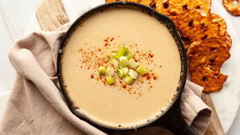 A bowl of cheese dip.