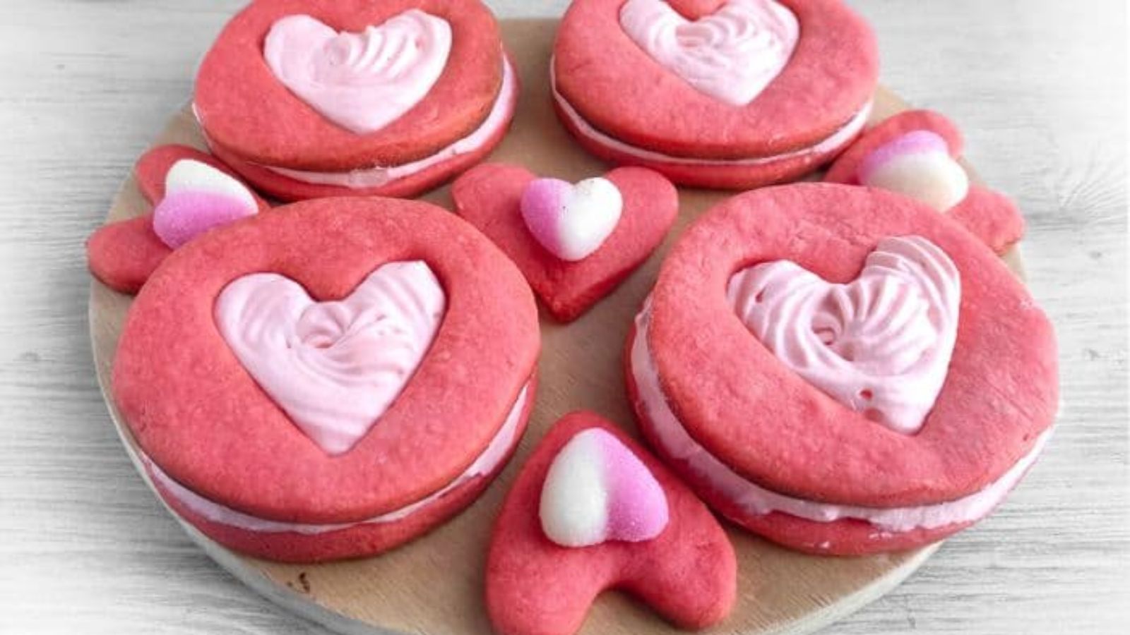 Heart sandwich cookies with filling.