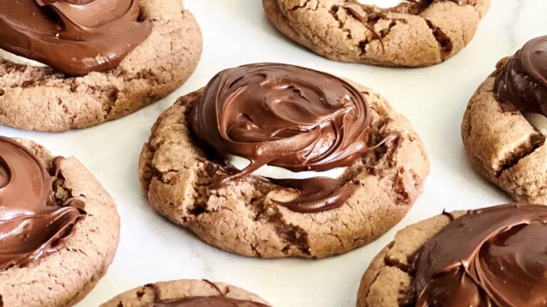 Cookies with chocolate cream on top.