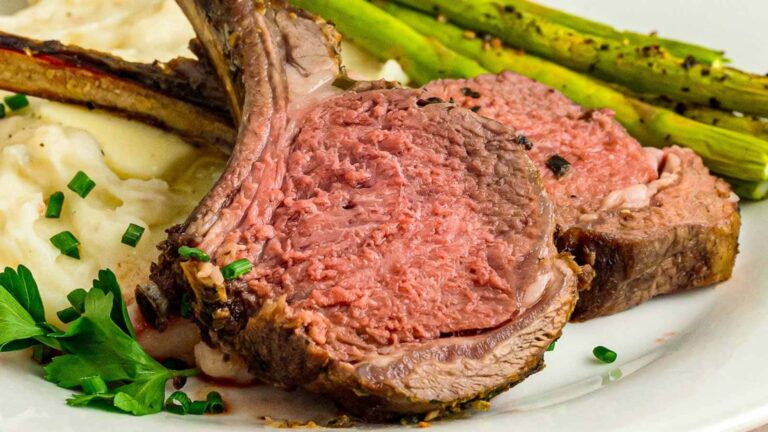 Close up of a sliced piece of rack of lamb.
