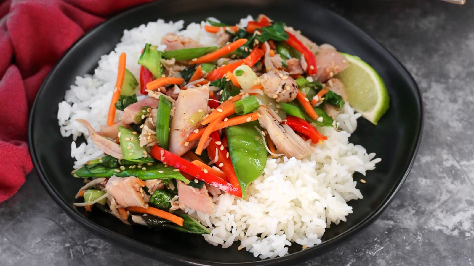 Rice with turkey stir fry on a plate.