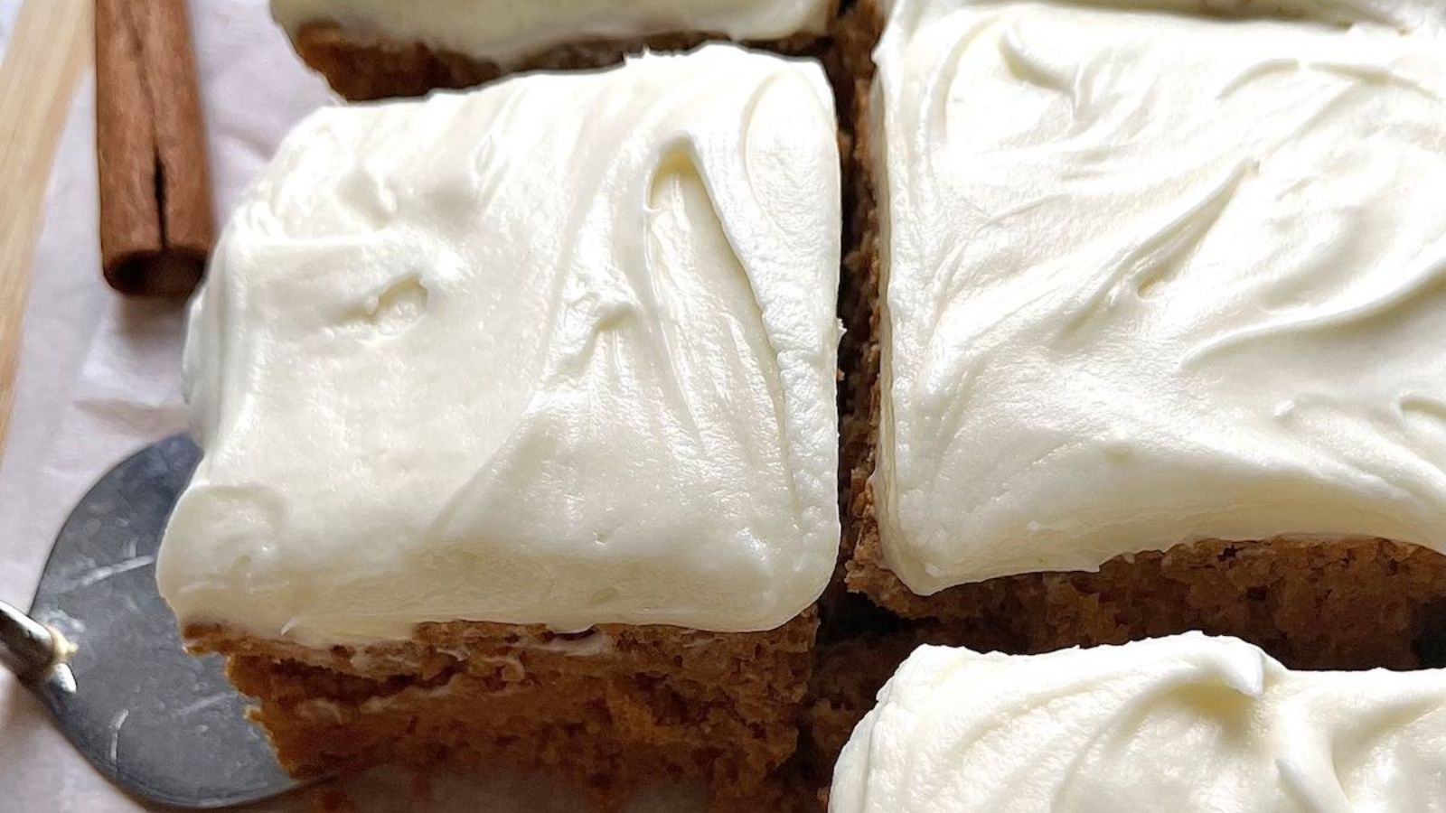 Slices of pumpkin cake with frosting.