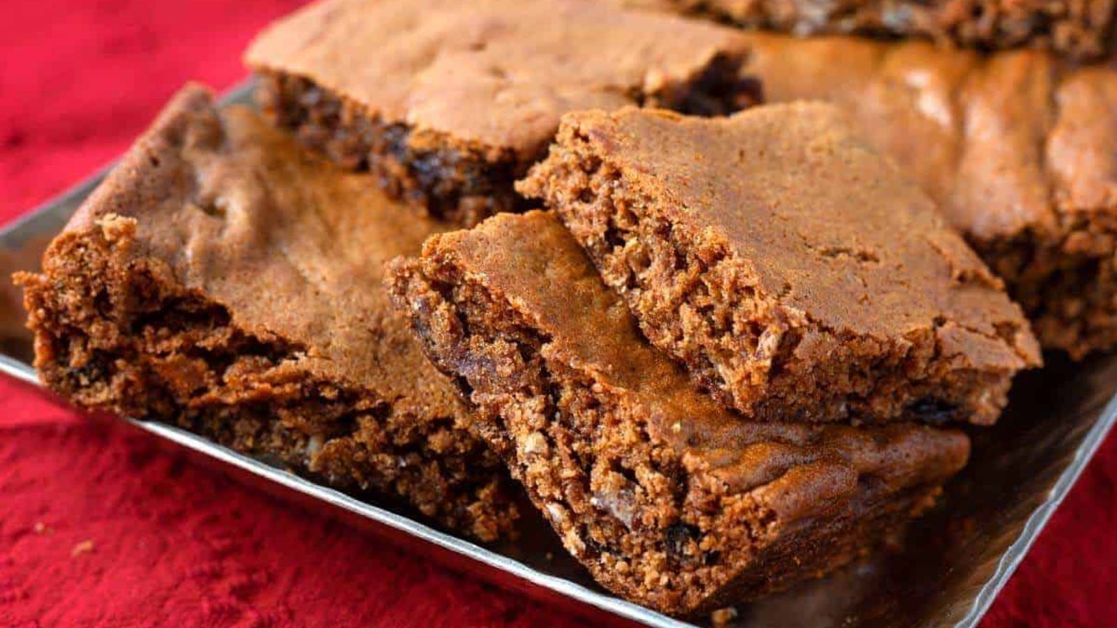 Raisin spice bars on a tray.