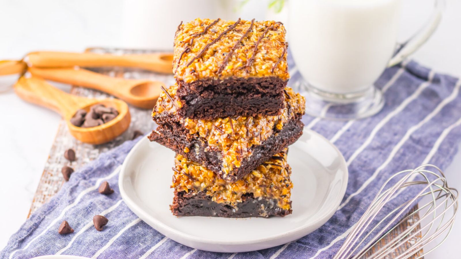 Stack of samoas brownies on a plate.