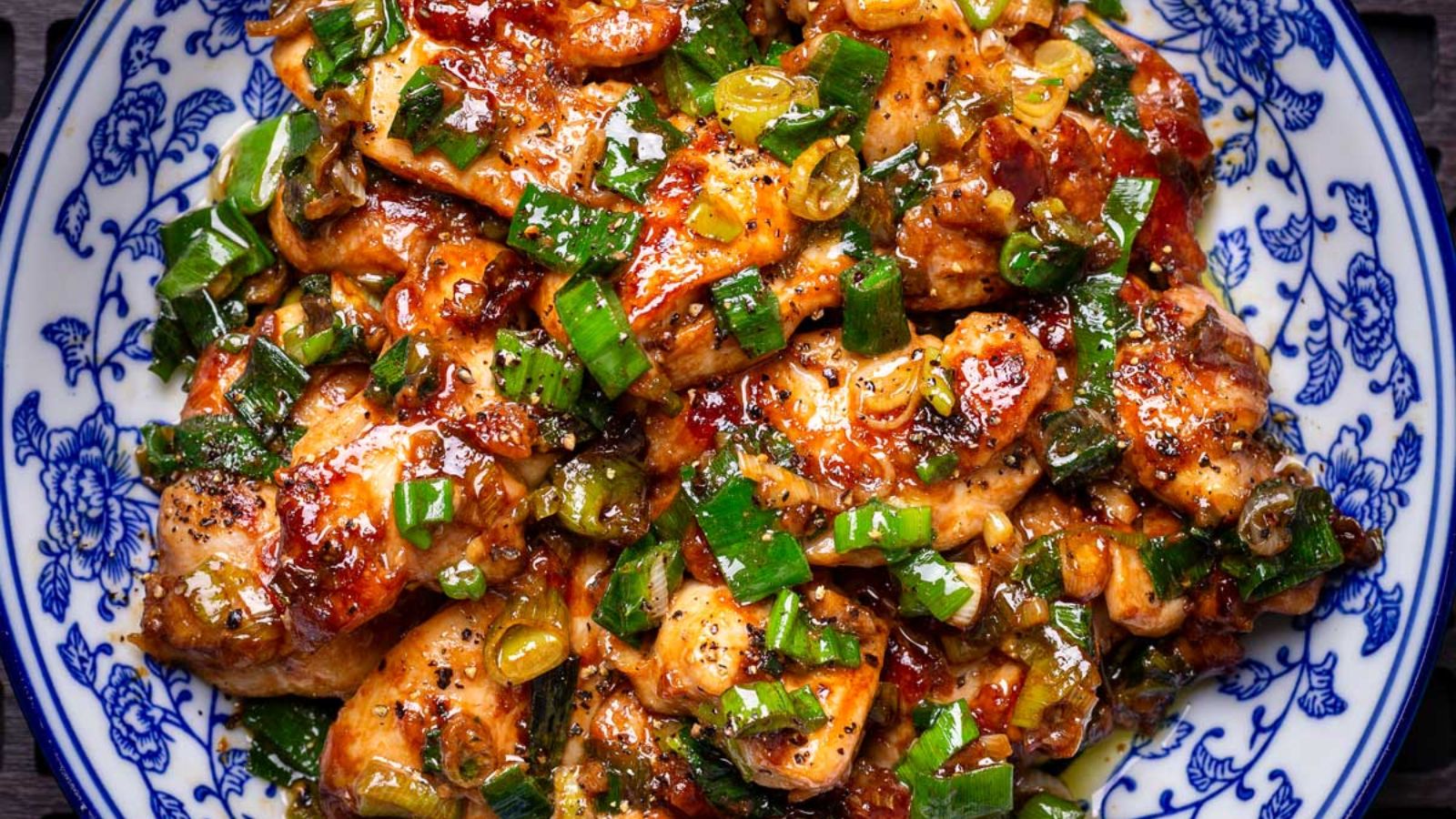 Scallion chicken in a bowl.