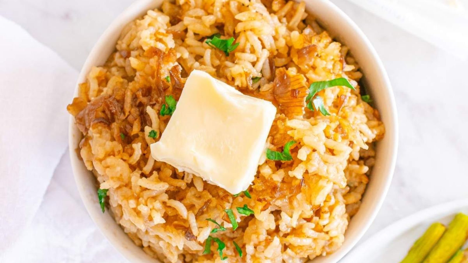 Butter rice in a bowl.