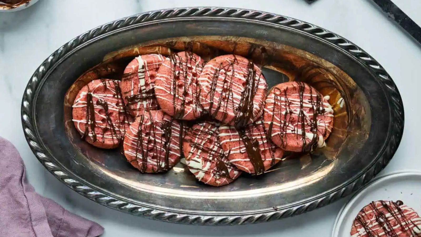 Strawberry shortbread cookies on a plate.