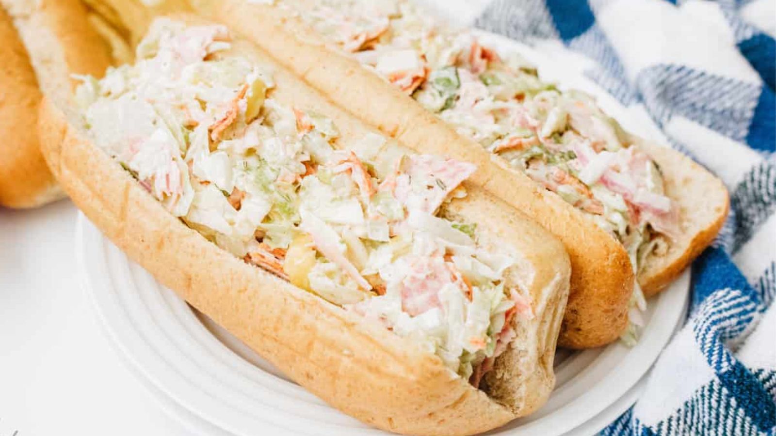 Two sandwiches on a plate.