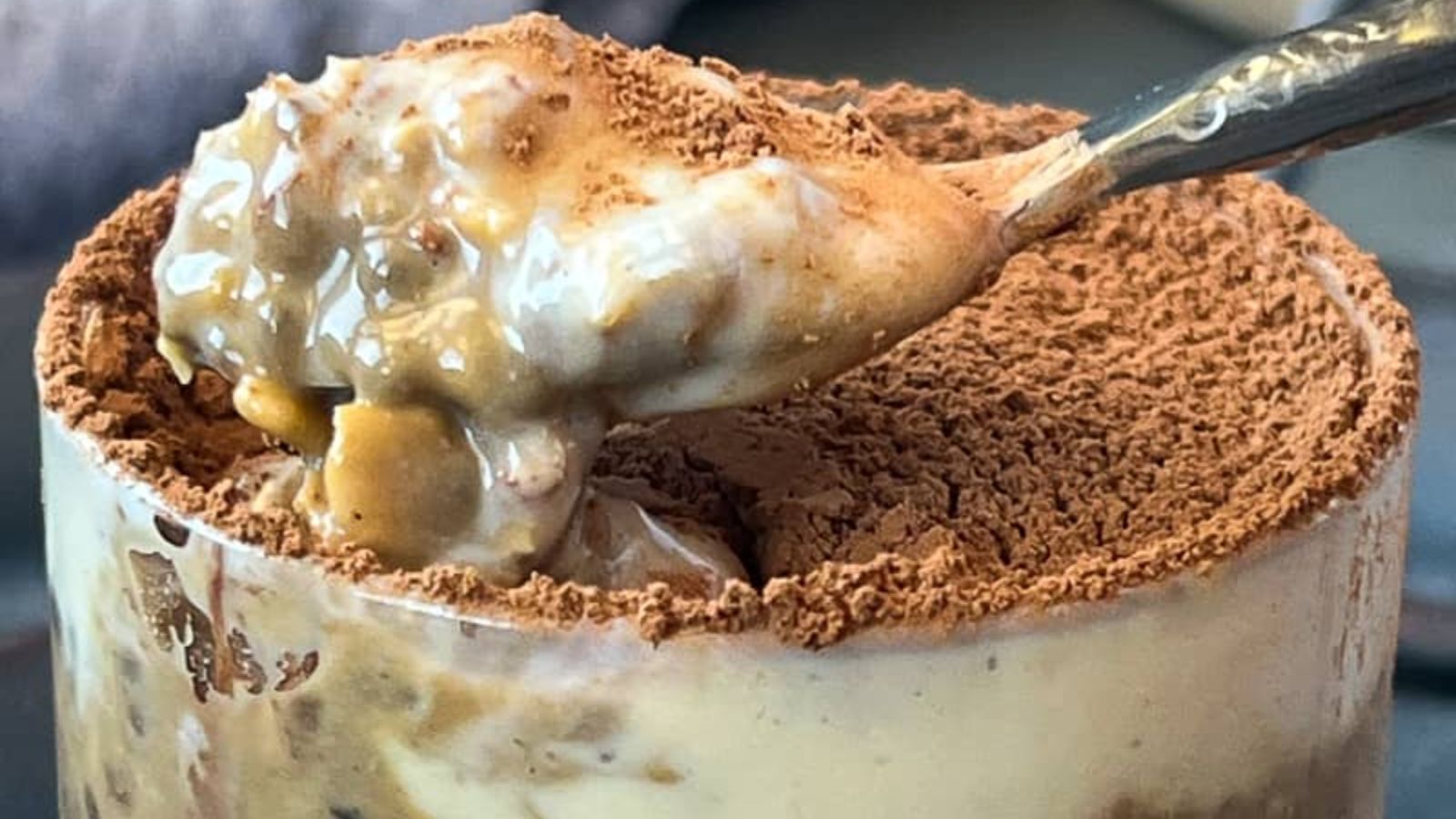 A spoon of tiramisu overnight oats.