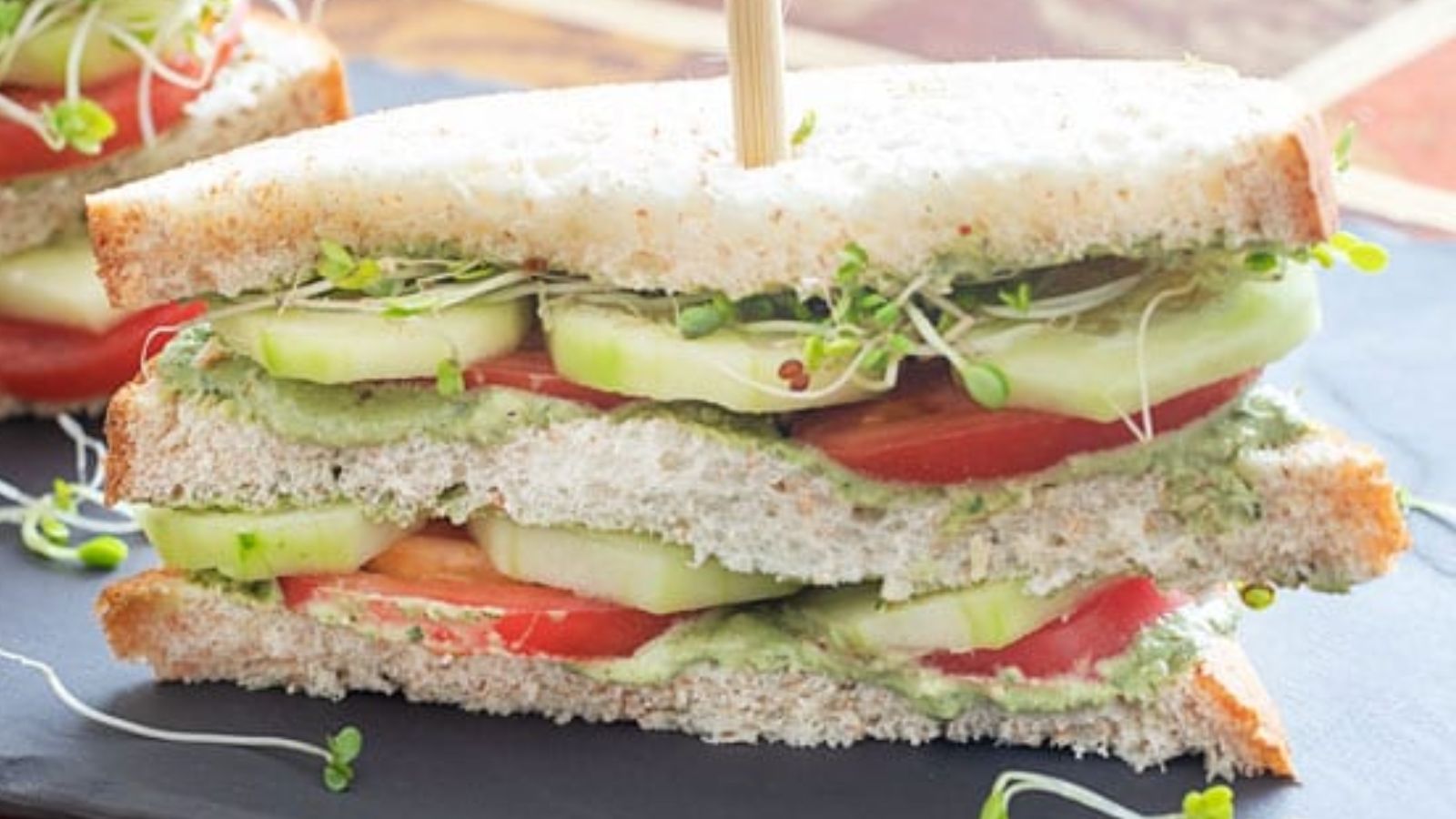 Tomato sandwich with cucumbers.