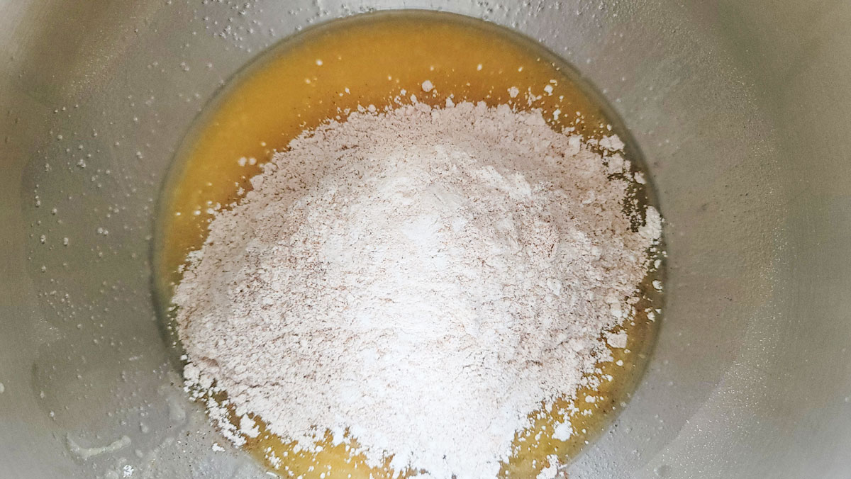 Flour mixture added to the wet ingredients.