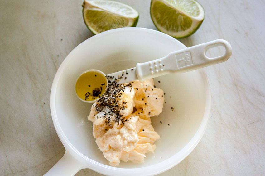 Dressing ingredients in a mixing bowl.