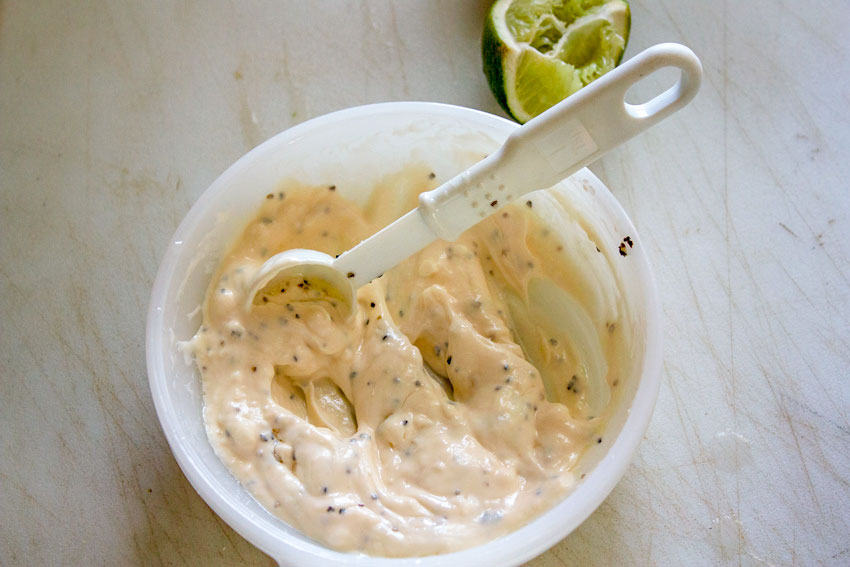 Dressing mixed up in the bowl.