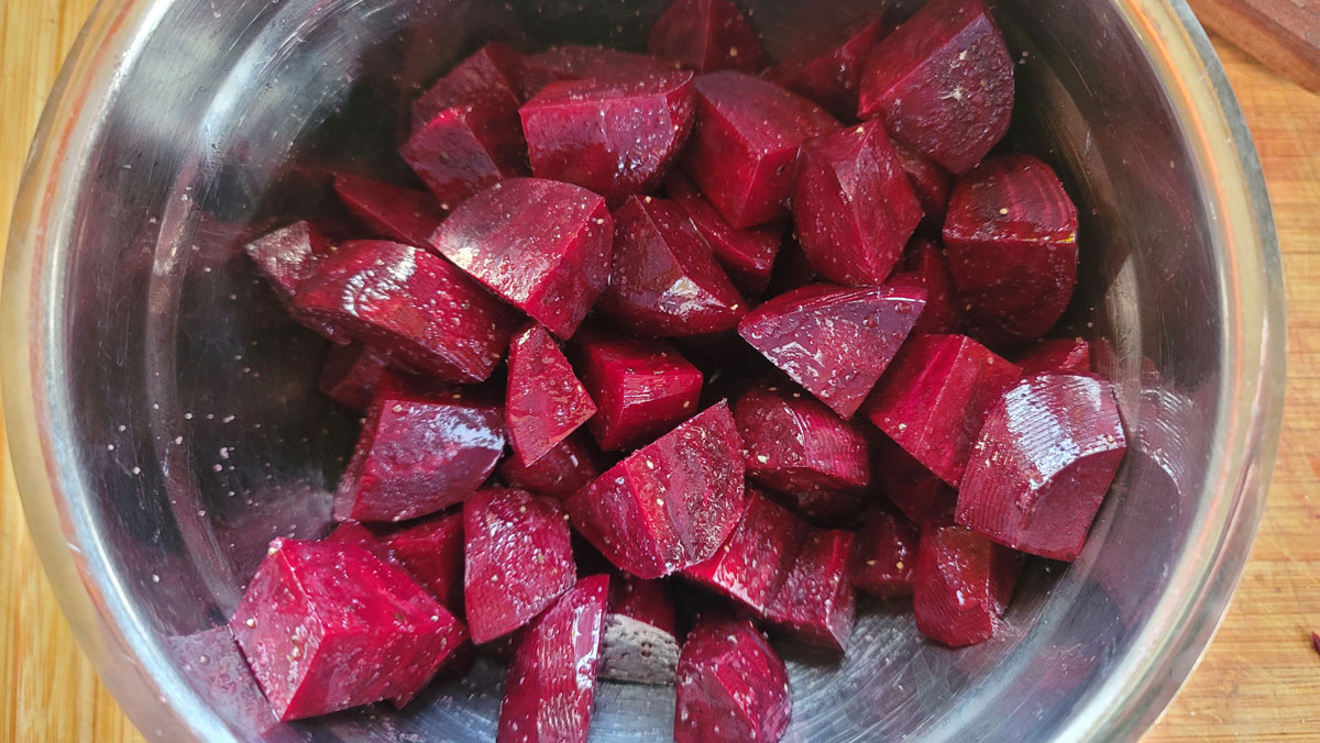 Cut up beets in a bowl, drizzled with olive oil and sprinkled with salt and pepper.