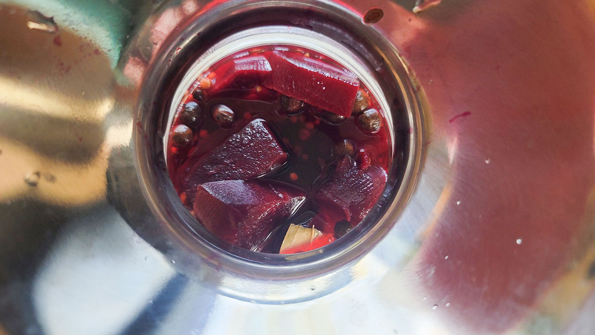 Pickling brine added to the jar.