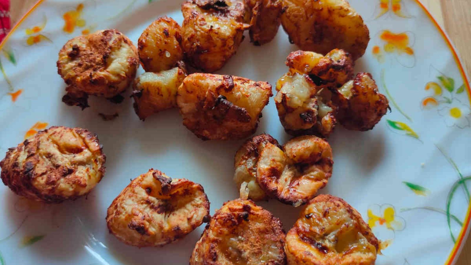 Fried banans on a plate.