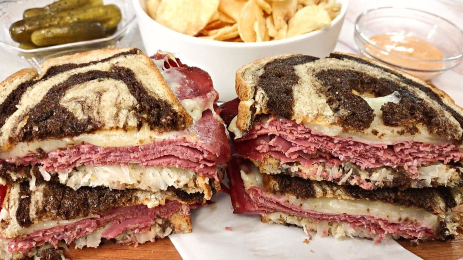 Reuben sandwich close up shot.