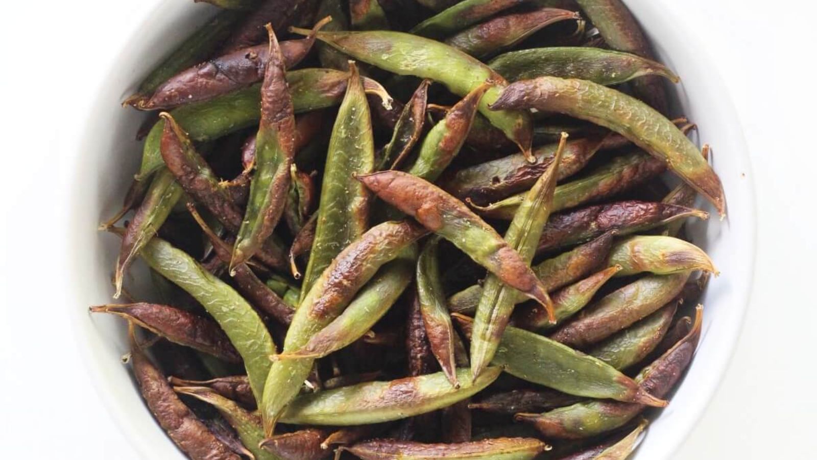 Sugar snap peas in a bowl.