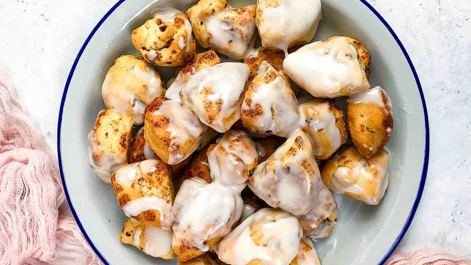 Cinnamon roll bites on a plate.