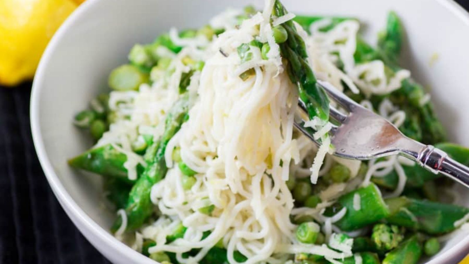 Asparagus pea lemon pasta in a bowl.