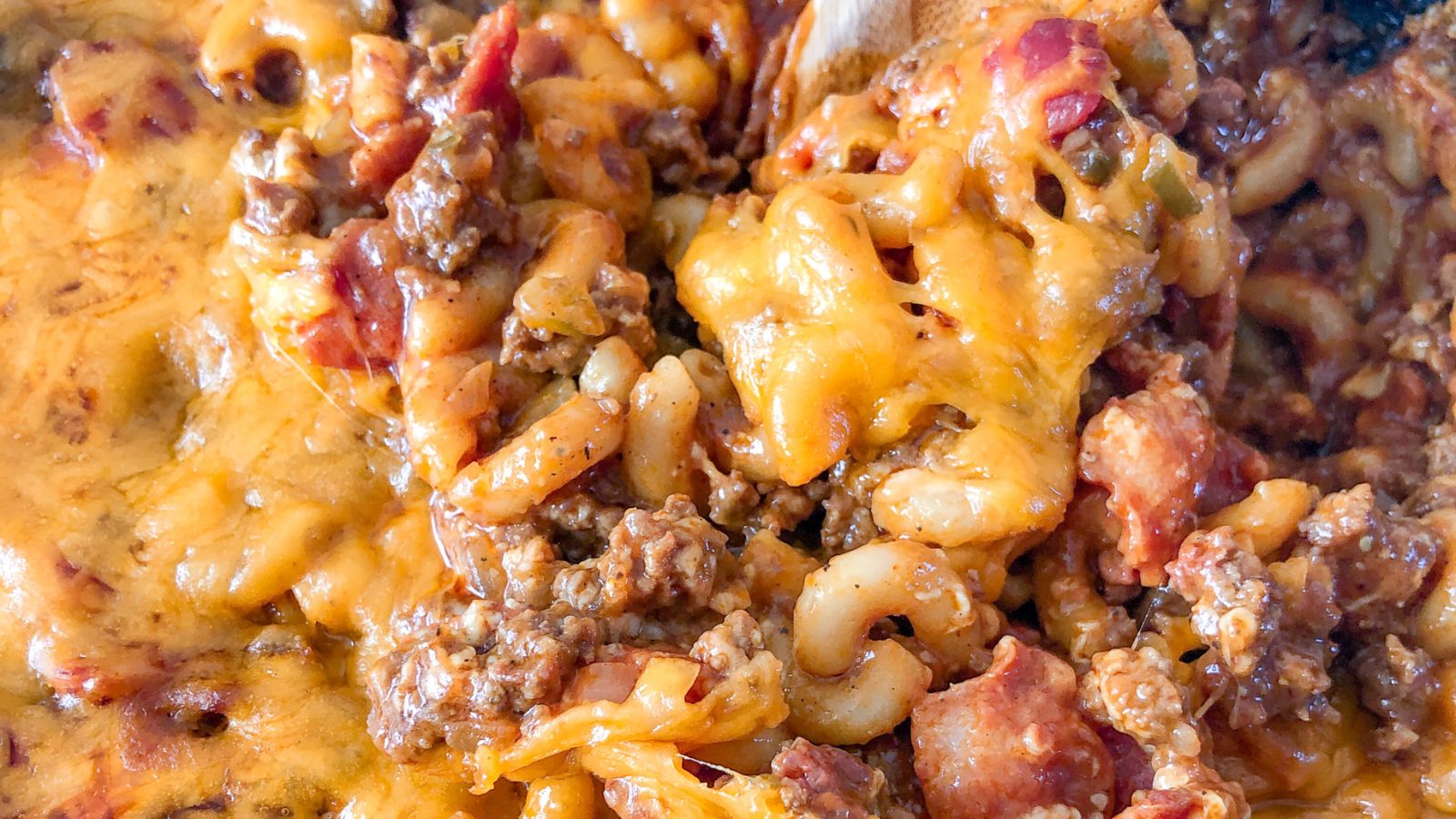 Bacon cheeseburger casserole in a skillet.