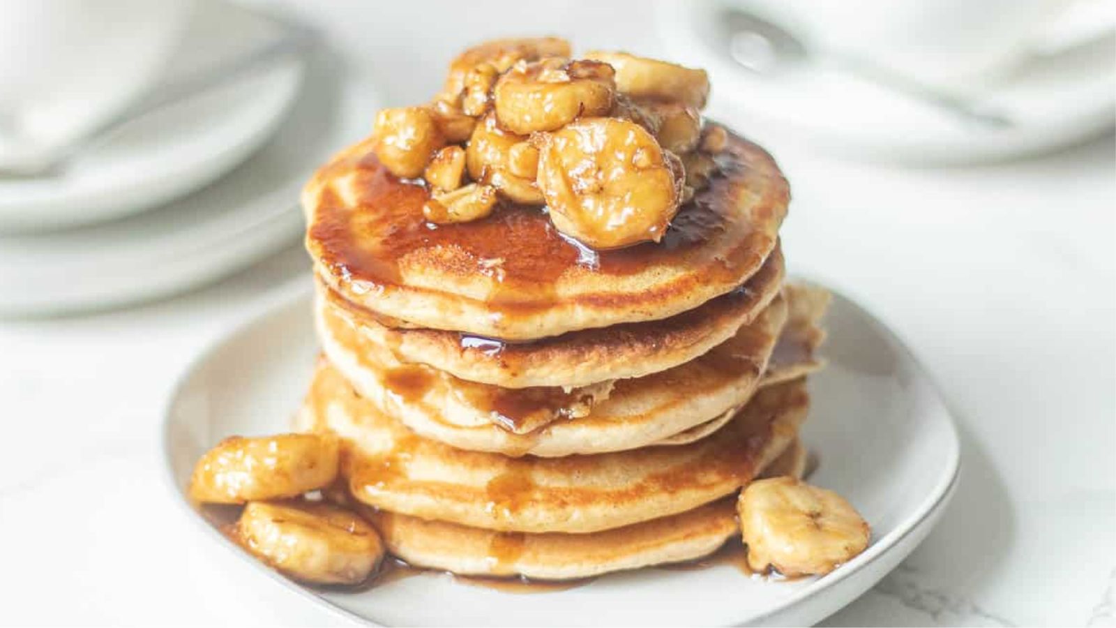 Stack of pancakes with banana.