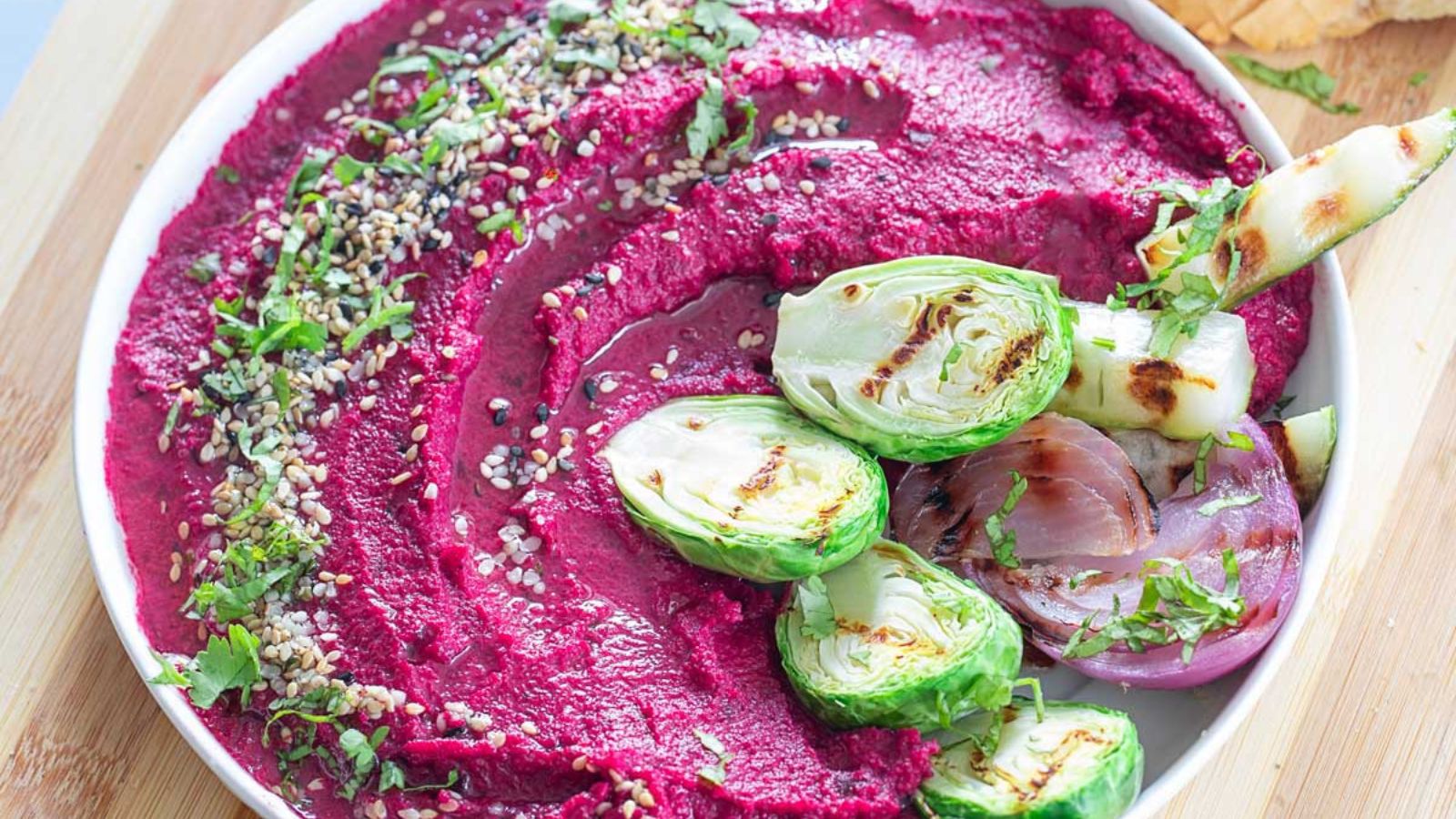 Beetroot hummus in a bowl.