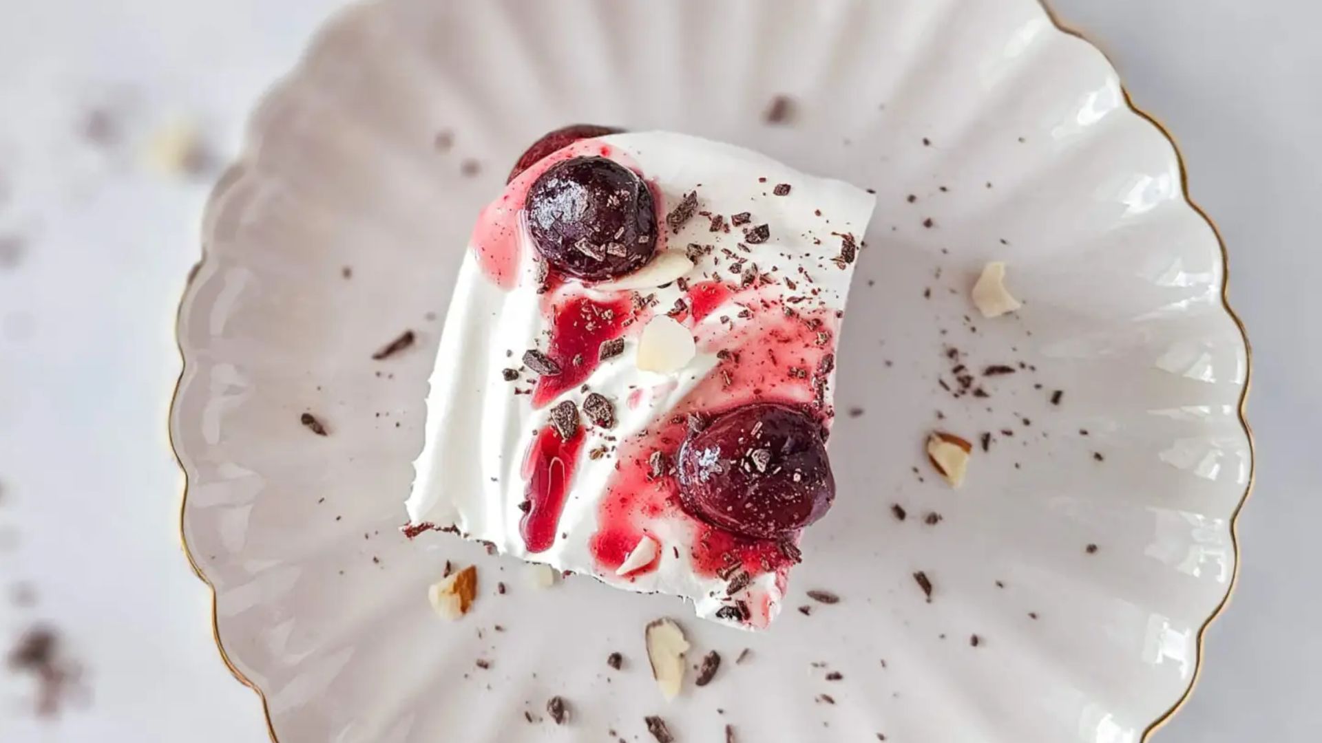 A slice of black forest cake on a plate.
