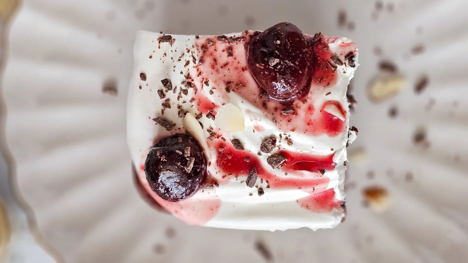 A slice of black forest cake on a plate.