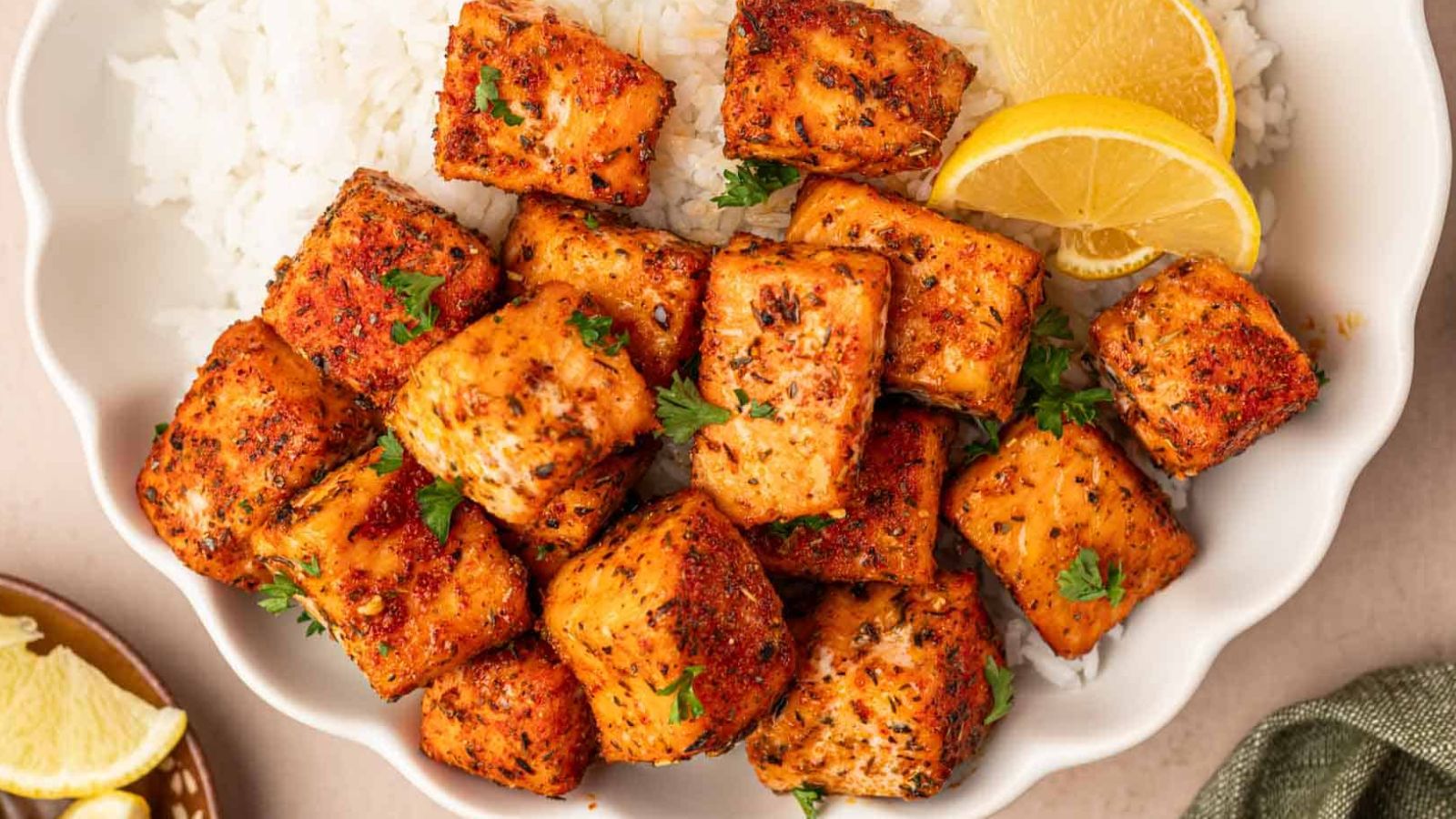 Salmon bites on a plate.