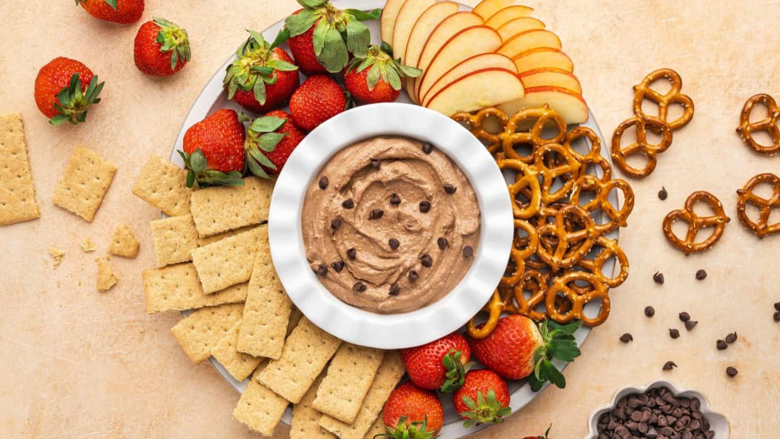 Batter dip with strawberries and biscuits.