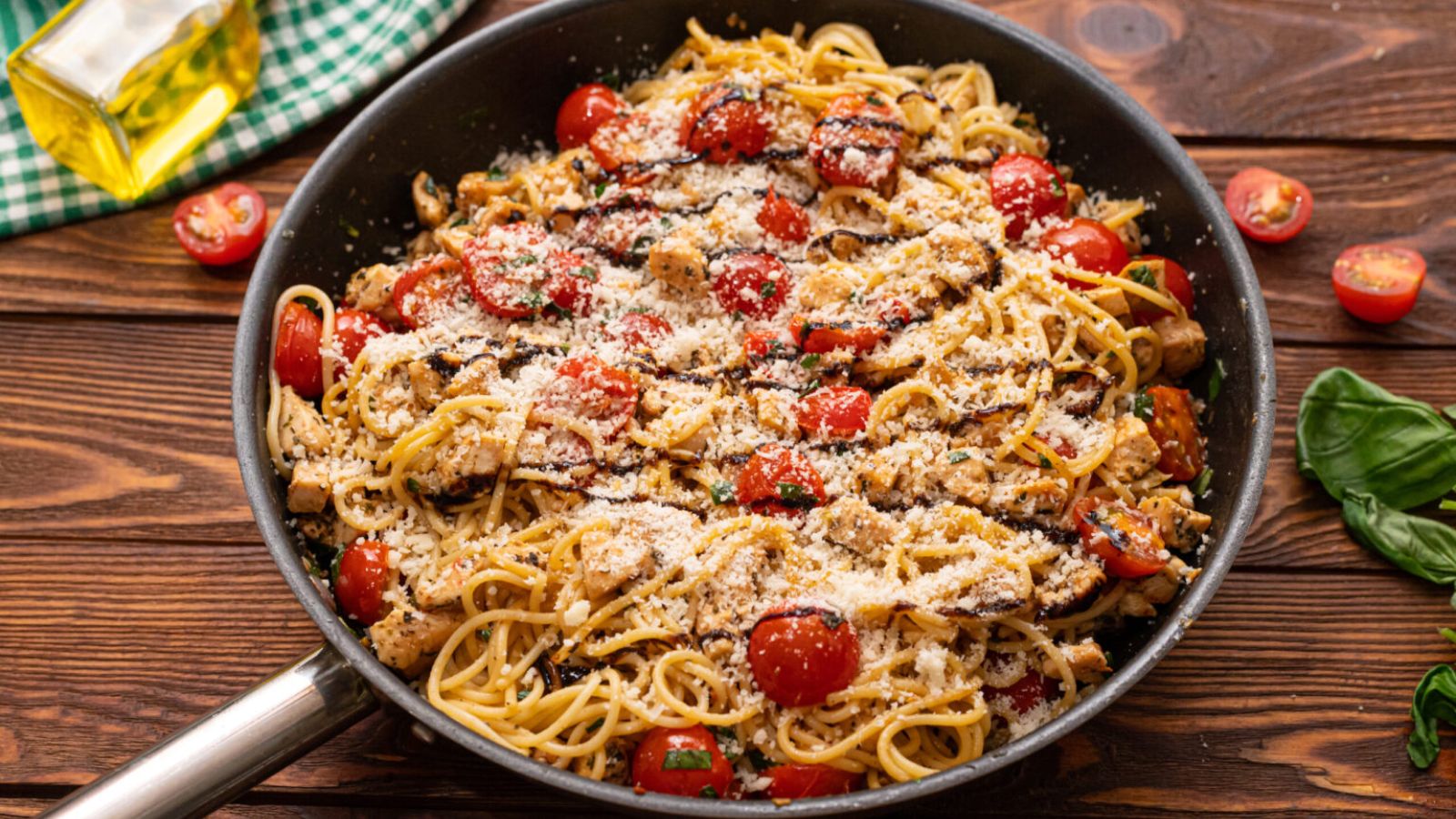 Bruschetta chicken pasta in a pan.